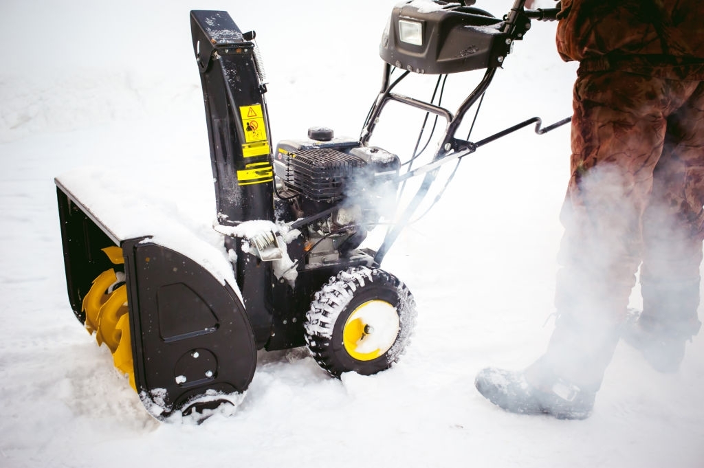 checking-the-wheels-of-snow-blower